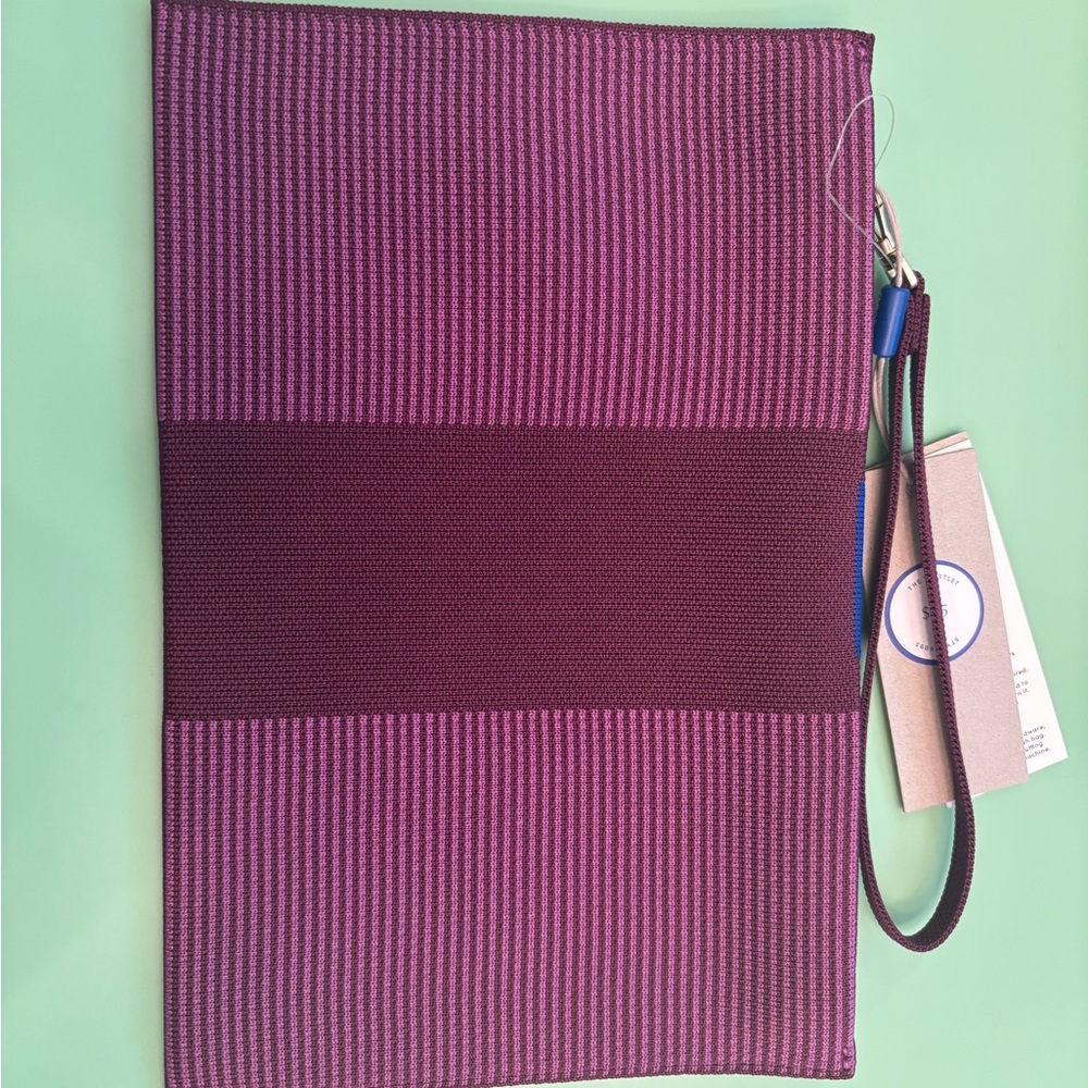 Rothy’s grape wristlet
